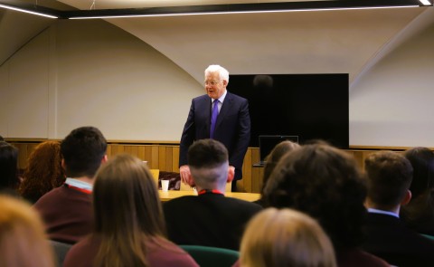 The education officer in a teaching session with students in a room in Leinster House